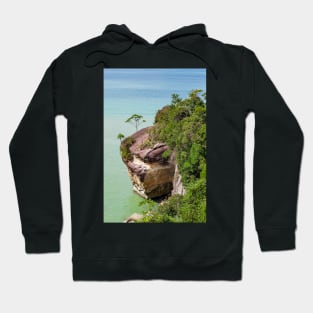 Cliff and trees at ocean shore landscape Hoodie